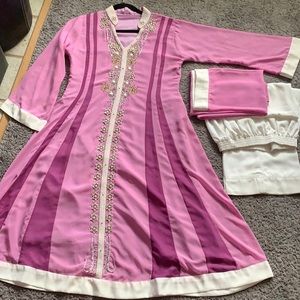 Pink and purple suit with pearls